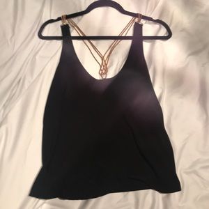 Black slinky blouse with rose gold chain straps